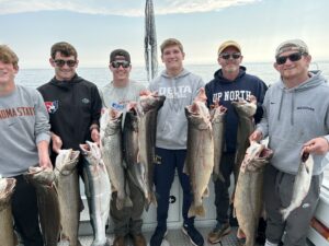 Group Fishing on a Leland Fishing Charter on Lake Michigan